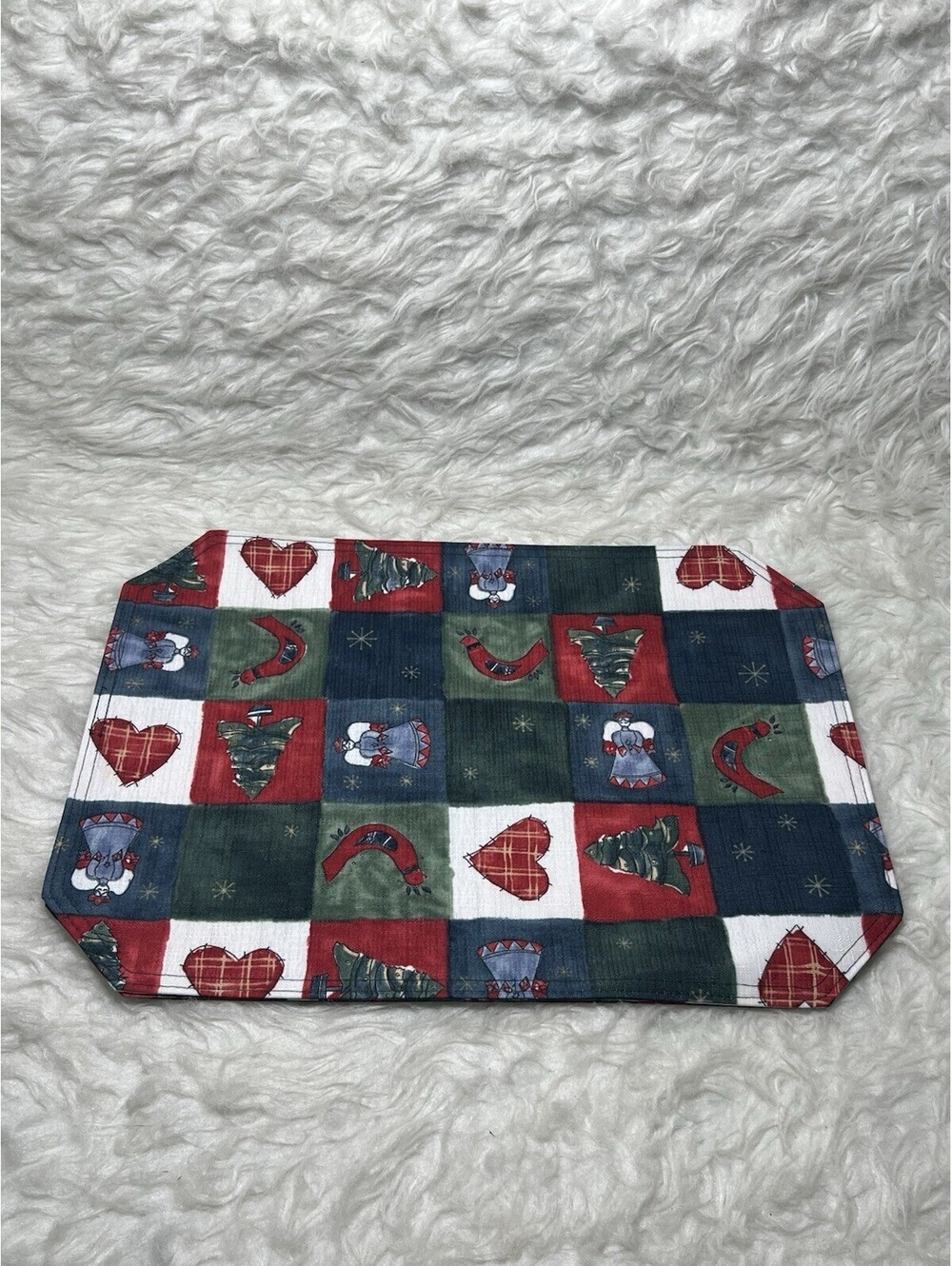 2 holiday-themed patchwork placemat